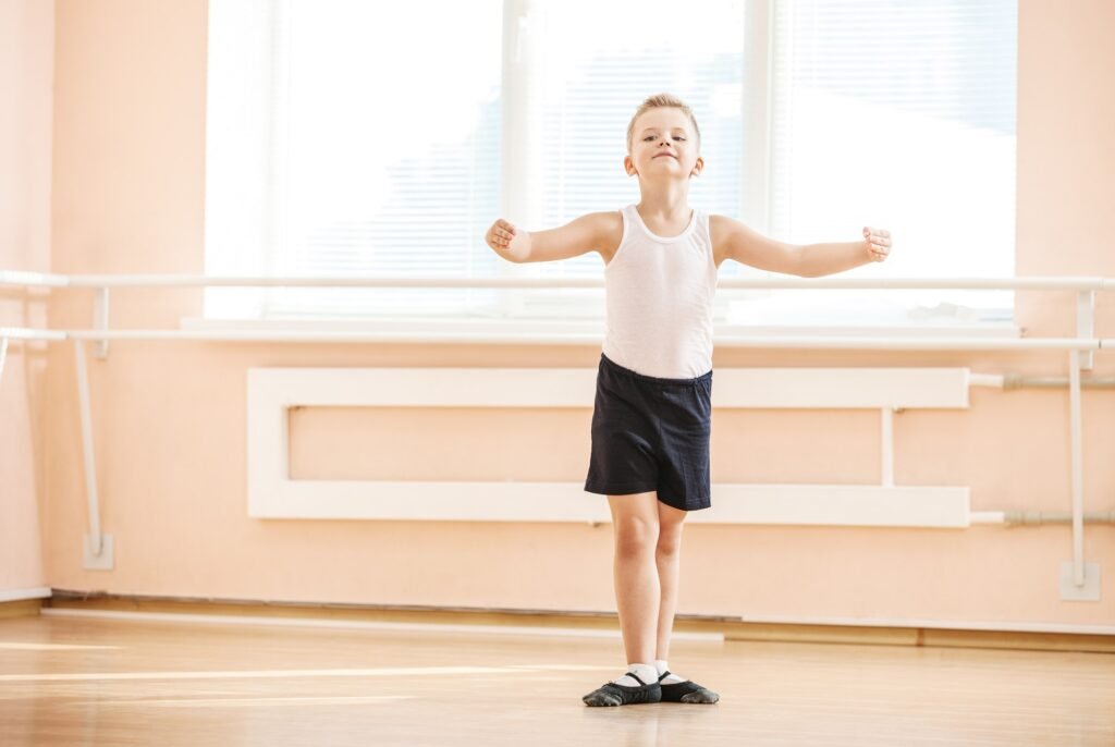 Boy dancing at a ballet class