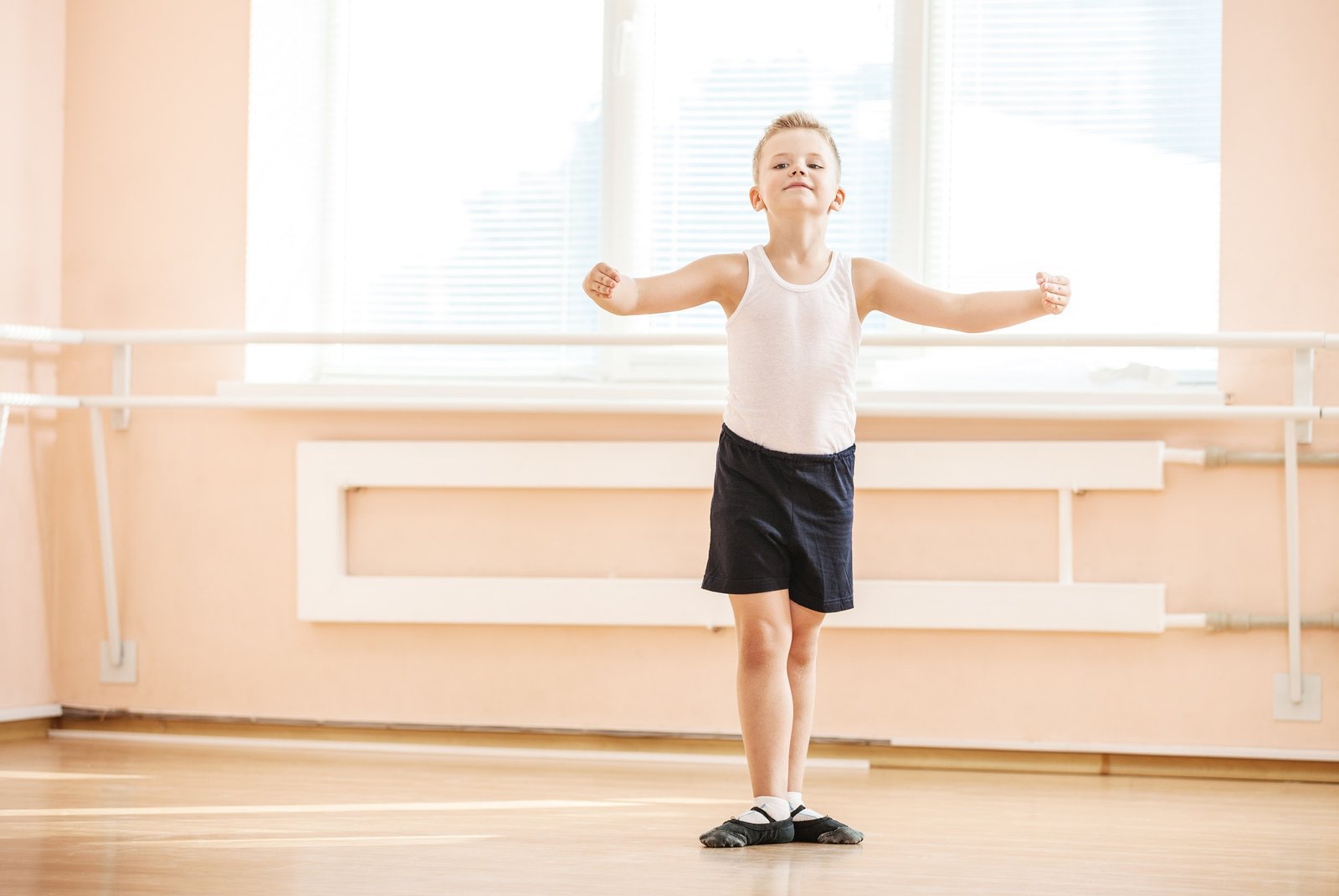 Boy dancing at a ballet class