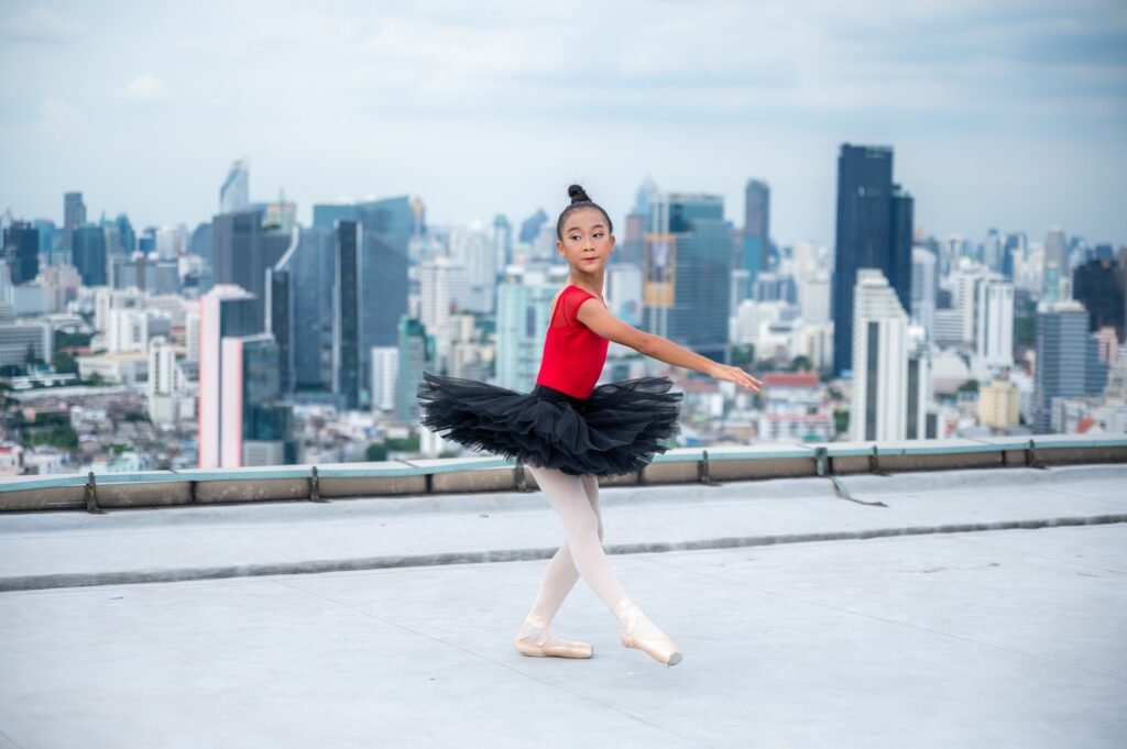 portrait of ballet dancer stretching motion education learning sport with elegance fun performance